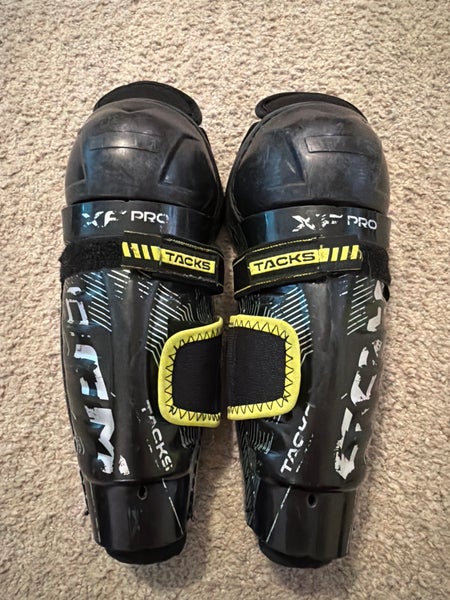 Youth CCM Tacks XF Pro 9" Shin Pads (Used)