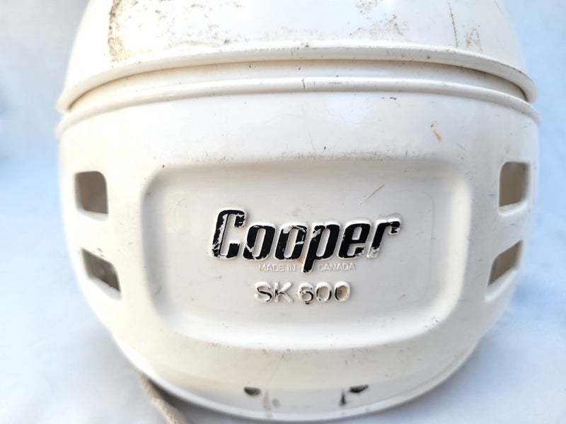 SK600 Helmet Pro Stock with A.H.A. sticker 79-80, #11 and Game Used type damage, Padding removed.