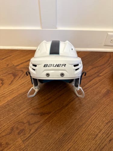 Medium White Bauer Re-Akt 65 Helmet (Used)