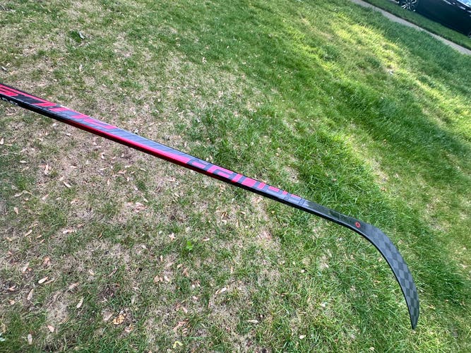 Intermediate Bauer Pulse Left Hand Hockey Stick P28 55 Flex Pro Stock (Used)