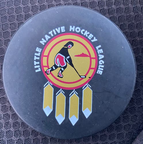 Little Native Hockey League puck