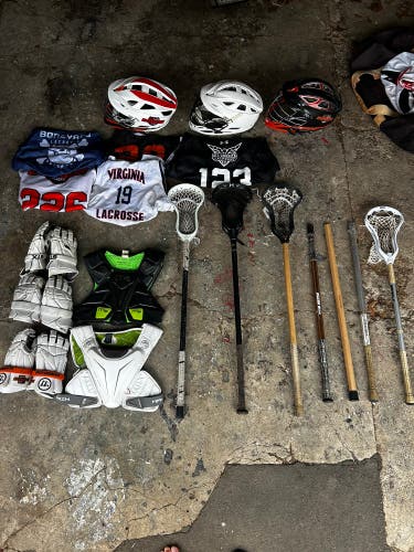 Lacrosse Gear Dump: Multiple Complete Sticks, Multiple Helmets, Gloves, Chest Protectors, Jerseys