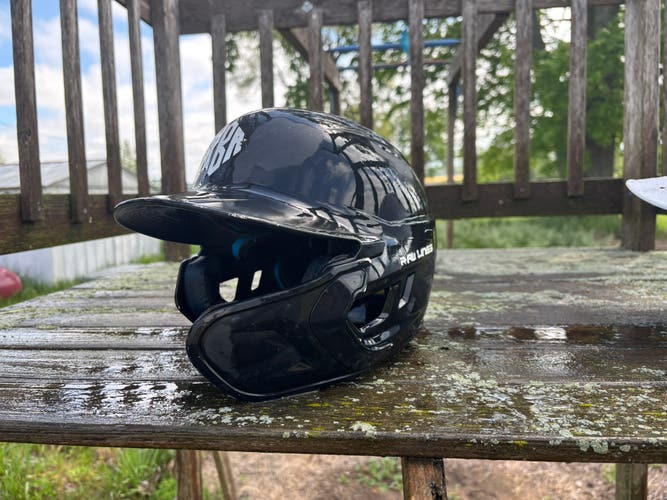 Black Rawlings Mach Batting Helmet with face protection (Used)