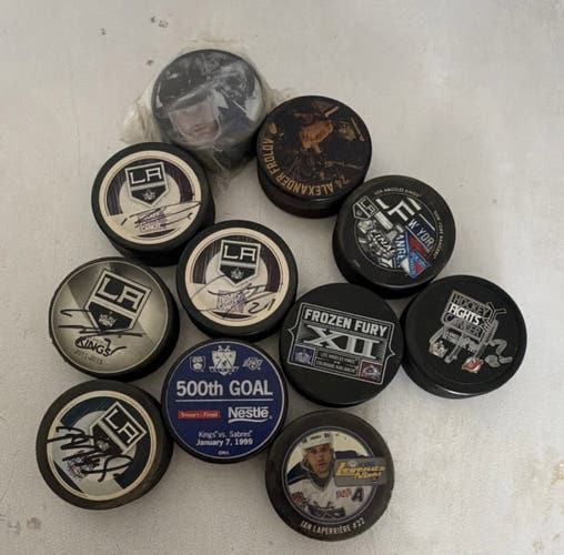 Bundle of 12 Vintage and Historic LA Kings Pucks (6 autographed)