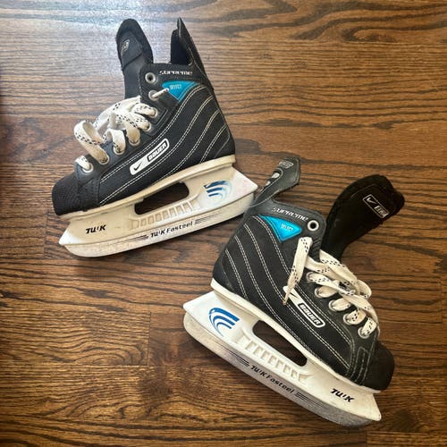 Black Bauer Supreme Select Hockey Skates Regular Width 12 (Used)