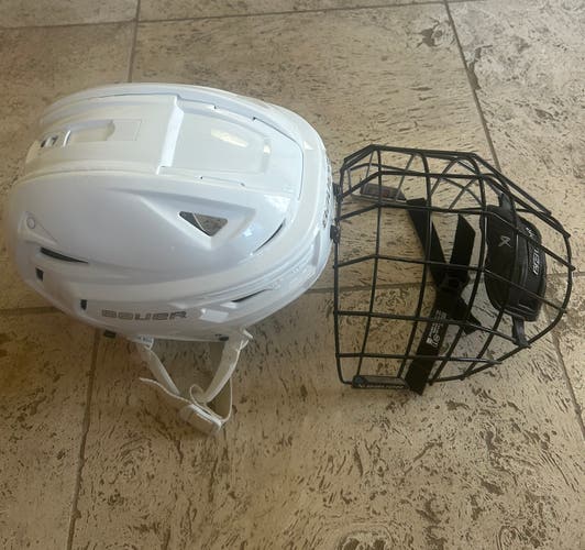 Large White Bauer Re-Akt 155 Helmet with cage (Used)