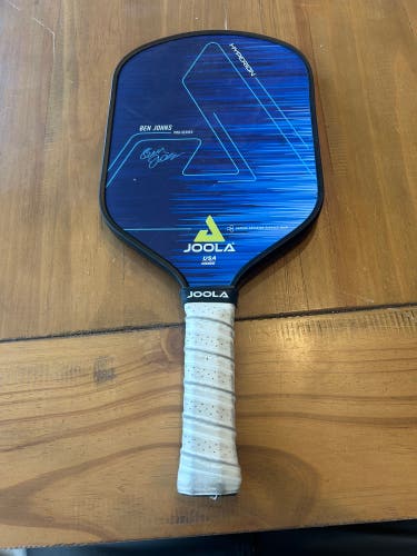 JOOLA Ben Johns Hyperion CAS pickleball paddle features a blue carbon surface and a white grip