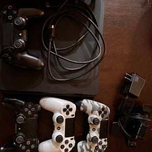 Sony Playstation 4 w/games and 4 controllers