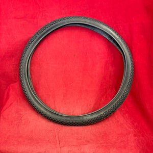 Bike Tire: Kenda K-Rad 24 *1.95 BMX tire featuring a checkerboard tread.