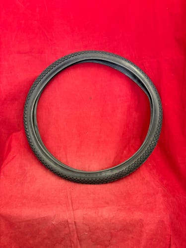 Bike Tire: Kenda K-Rad 24 *1.95 BMX tire featuring a checkerboard tread.