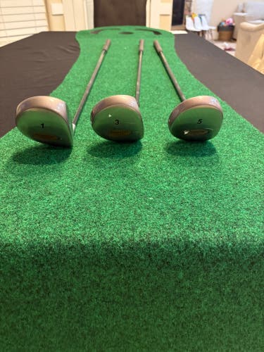 Golf Drivers/ Woods: Frontier S-Metal golf clubs, including a 1, 3, and 5 wood. Shaft: Integra Perfo