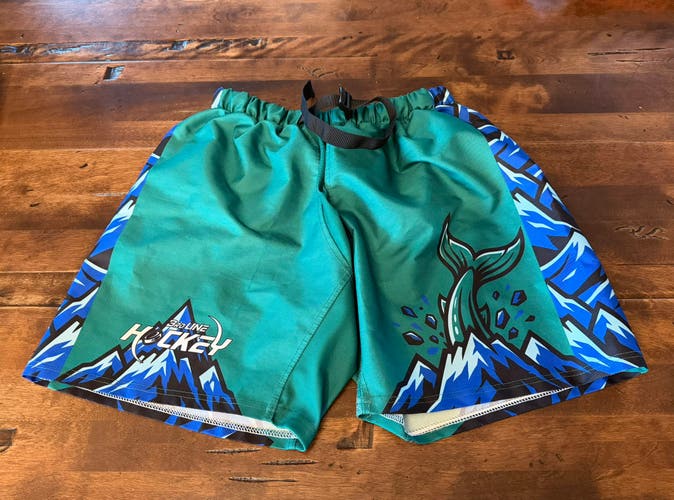 Green and Blue Shells with Mountains and Fish