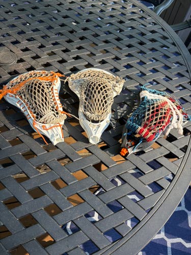 Three Used Heads - Maverik Metrik Adidas D-Monic, and Warrior Burn 2