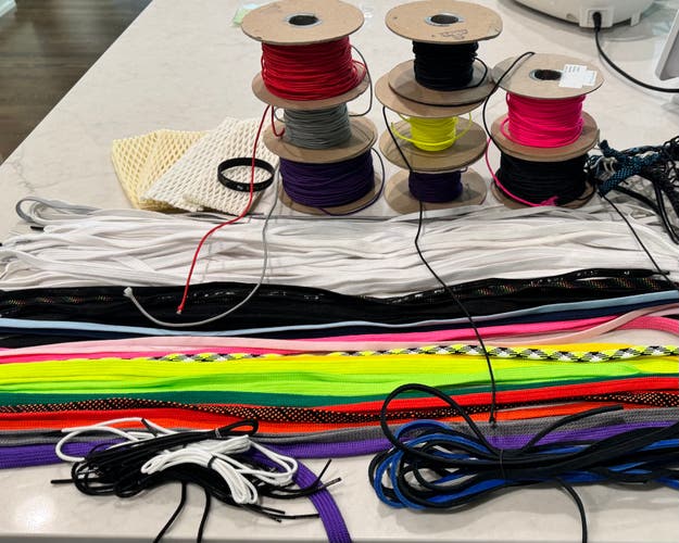 (New and used) LOT of Stringing supplies...shooting strings, sidewall spools, leather strings