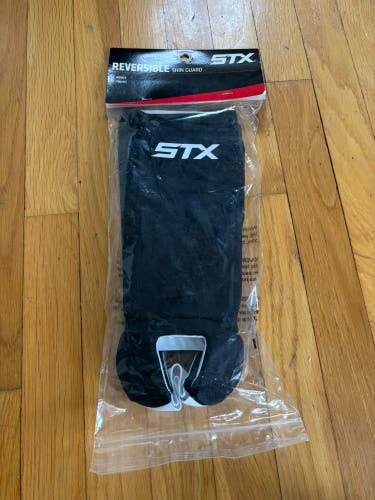 STX reversible youth shin guards (New)