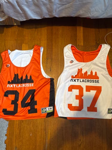 Small / Medium NXT Boys Jersey (Used)