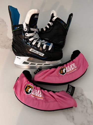 Black/White Bauer Hockey Skates 11 (Used)