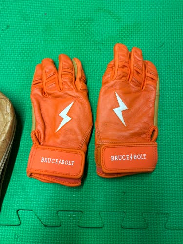 Youth Large Batting Gloves Bruce both orange and white (New)