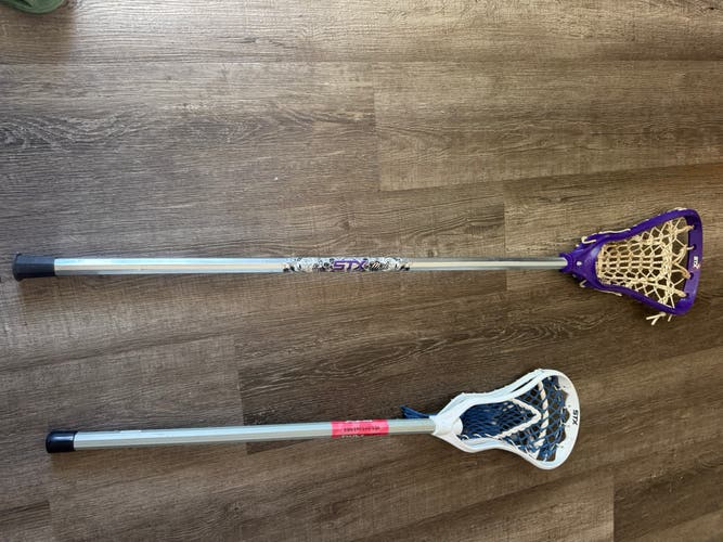 Two sticks -  one adult one kids-  bag, eye protection, gloves