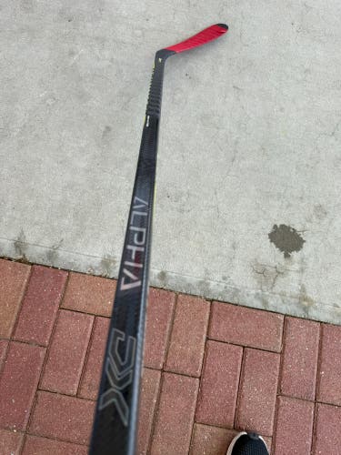 Intermediate Warrior Alpha DX Hockey Stick Right Handed M03 55 Flex (Used)