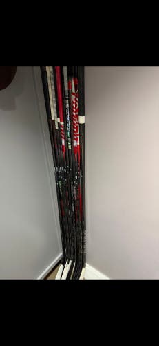 Bundle of 11 Intermediate Right Handed Hockey Stick Mid Pattern 55 Flex Pro Stock (Used)