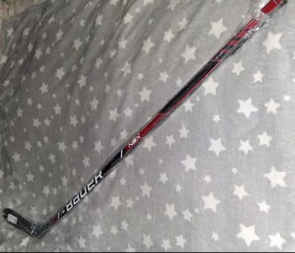 New Bauer NSX hockey stick with 40 flex and P92 blade pattern & 3 pucks