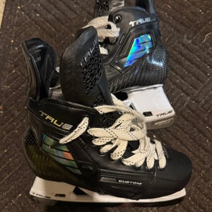True Pro Custom Hockey Skates Size 6.5 
With 2 sets of steel. (Used)