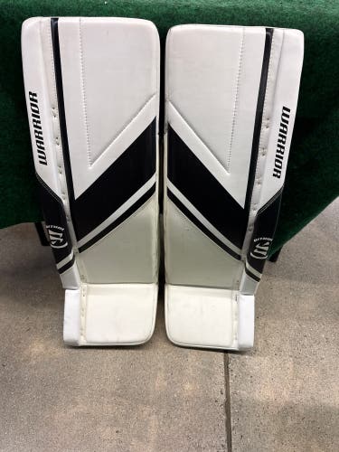 White & Black Junior Warrior Ritual G6 E+ Goalie Leg Pads (Used) | 30”+ 1”