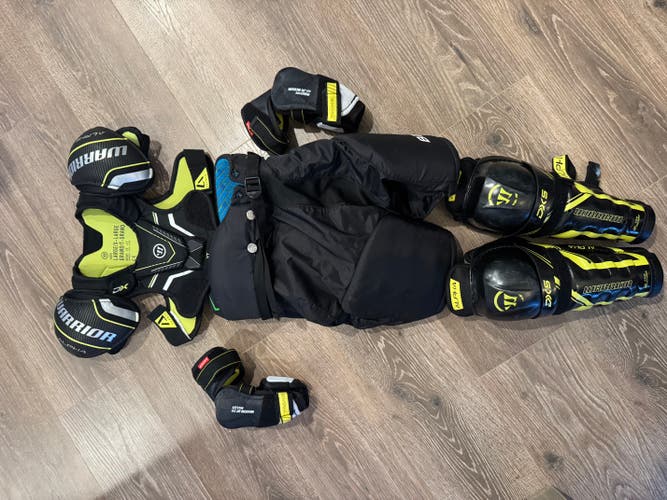 Youth hockey Warrior/Bauer protective set. Chest, elbow and shin pads and pants.