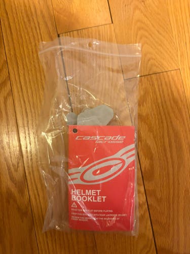 Bundle of Lacrosse Ultd Platinum strings and Cascade Lacrosse helmet pads