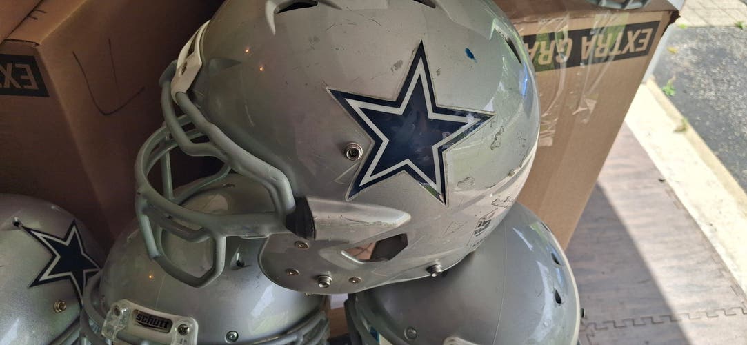 1 bundle of 10 expired Dallas Cowboy Helmets
