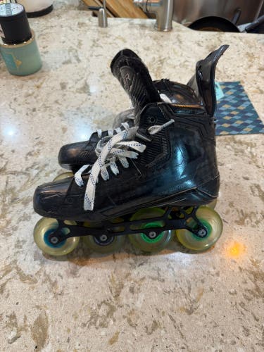 Blacked out Bauer Supreme Mach Fit 3