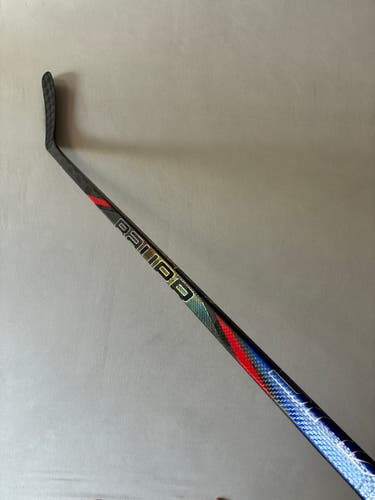 Used 65 Flex P88 Intermediate Bauer Nexus Tracer Right Hand Pro Stock Hockey Stick - Blue/Red