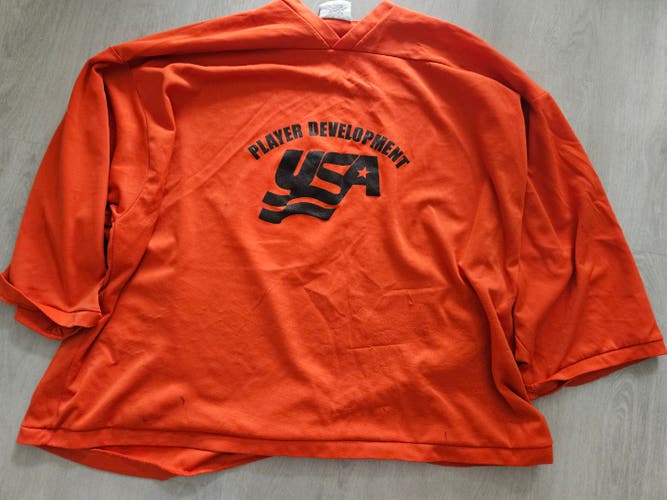 Used Orange and Red Goalie Practice Jerseys