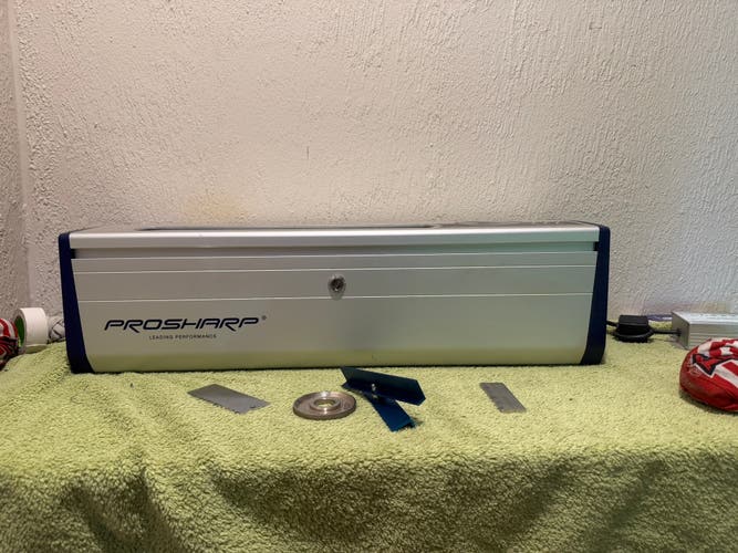 Bauer (Used) at home skate sharpener. Comes w accessories and wheels. -Free shipping