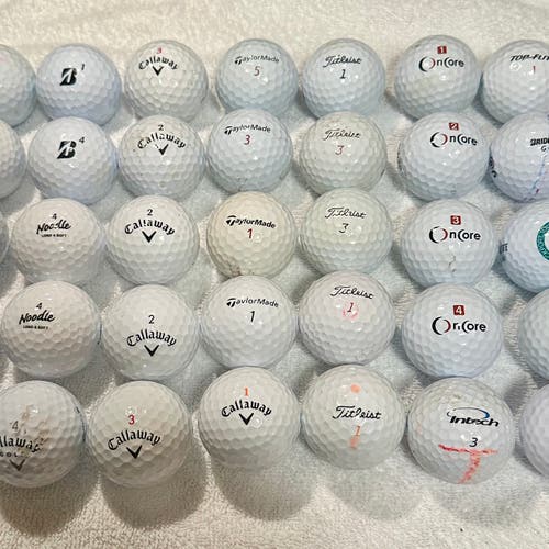 35 USED GOLF BALLS