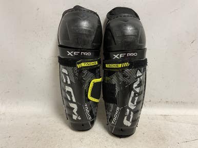 Used CCM TACKS XF PRO Youth Shin Guards Black And Yellow 10" 11855-S000206227
