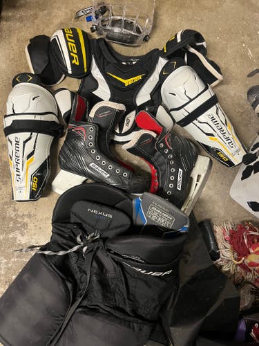 Youth Junior Bauer hockey gear and skates