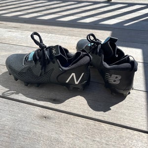 Black Men's Size M 7.0 (W 8.0) New Balance Freeze 3.0 Low Top Cleats (Used)