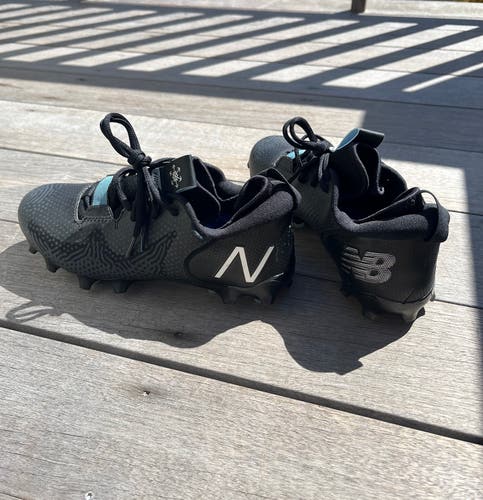 Black Men's Size M 7.0 (W 8.0) New Balance Freeze 3.0 Low Top Cleats (Used)