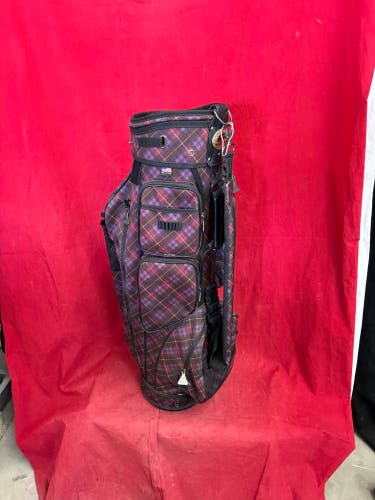 Golf bag: Bennington golf cart bag in a black and maroon plaid pattern.
