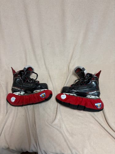 Black Bauer Vapor x 2.7 Hockey Skates Regular Width 13 (Used)