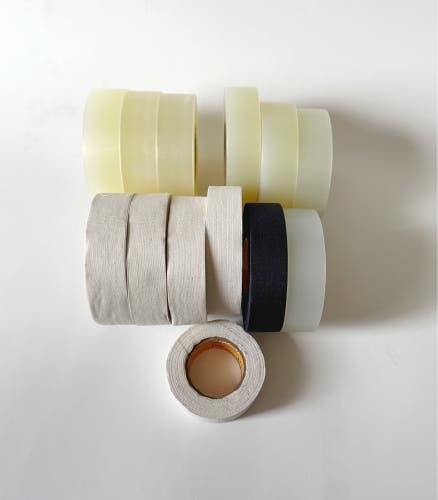 12+1 Rolls of new Howies Hockey Tape. Black, white, clear