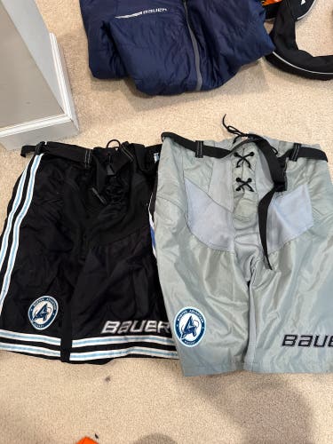 2 pack of Medium Bauer Team Pant Shells