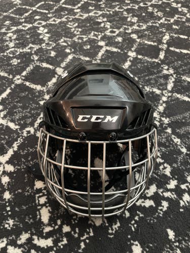 Medium CCM Helmet (Used) one adjustable part broken