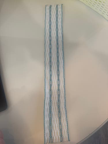 White Lacrosse Mesh with Teal Runner Pattern – New