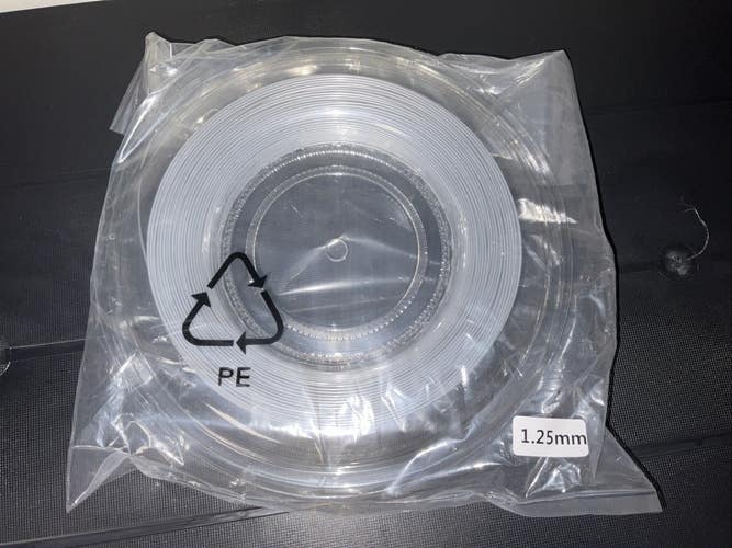 The Tennis Shoppe Silver Polyester Tennis String Reel- 200m/660ft
