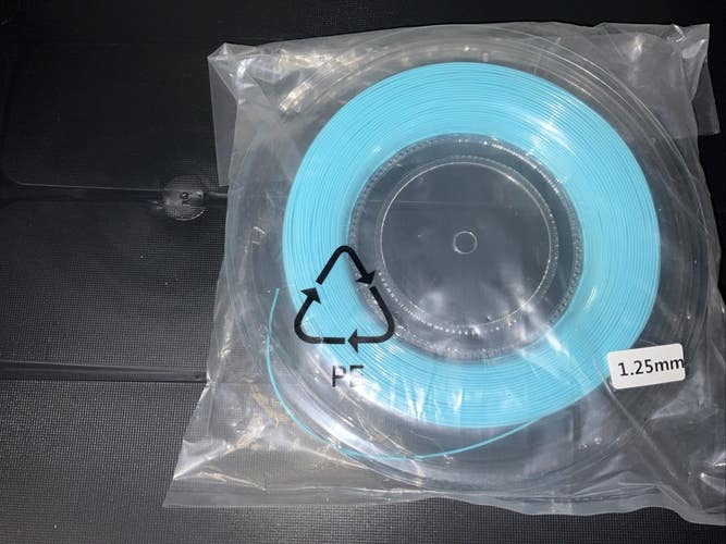 The Tennis Shoppe Light Blue Polyester Tennis String Reel- 200m/660ft