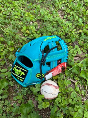 Rawlings Heart of the Hide 11.5” Standard Fit Teal Post Web Wing Tip