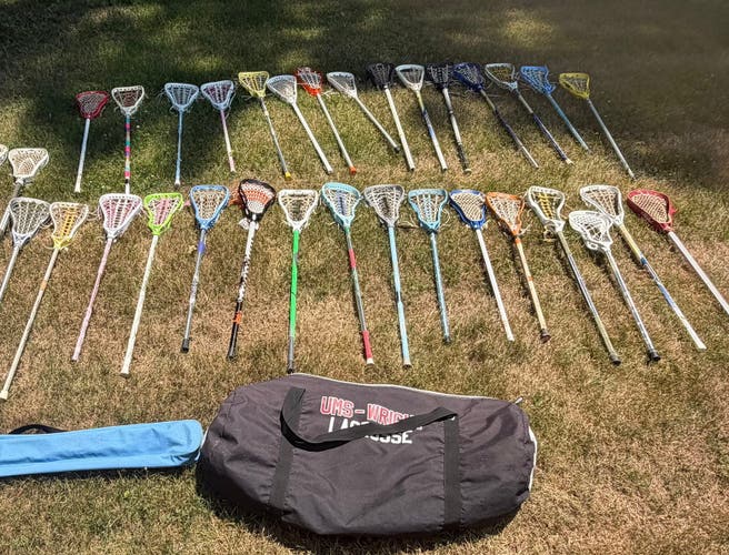 Huge lacrosse stick bundle SALE! First person takes all of them! Bags included!